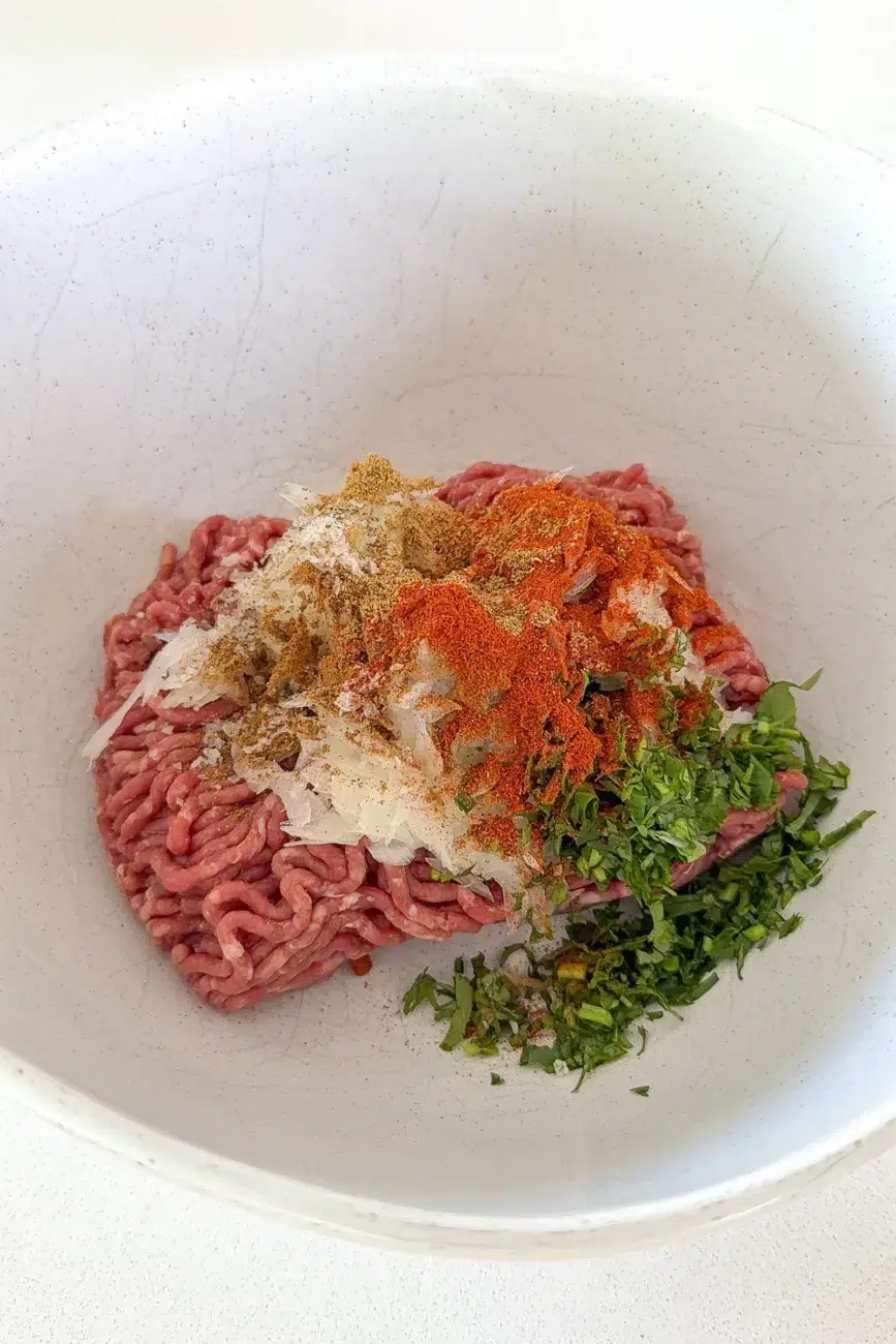 stuffed pita arayes ingredients in mixing bowl