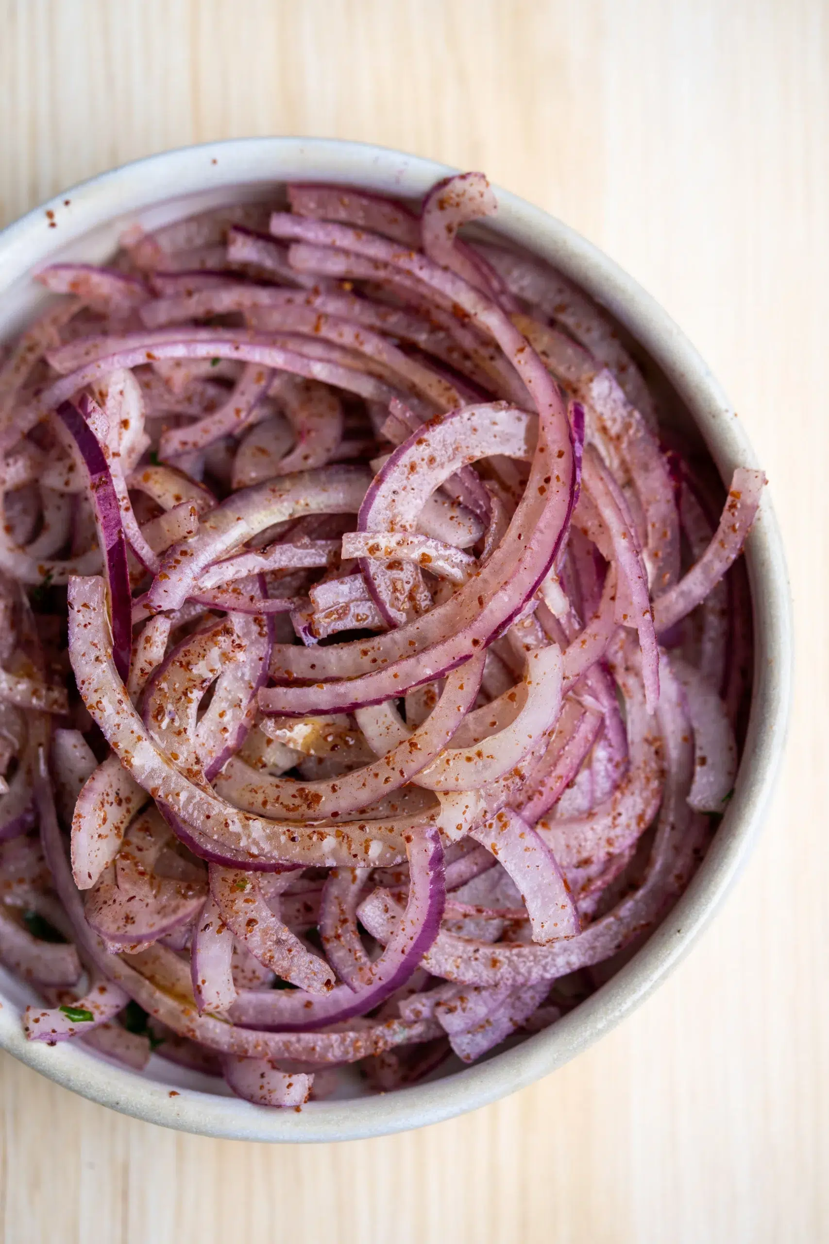 Completed dish of tangy sumac onions ready to serve